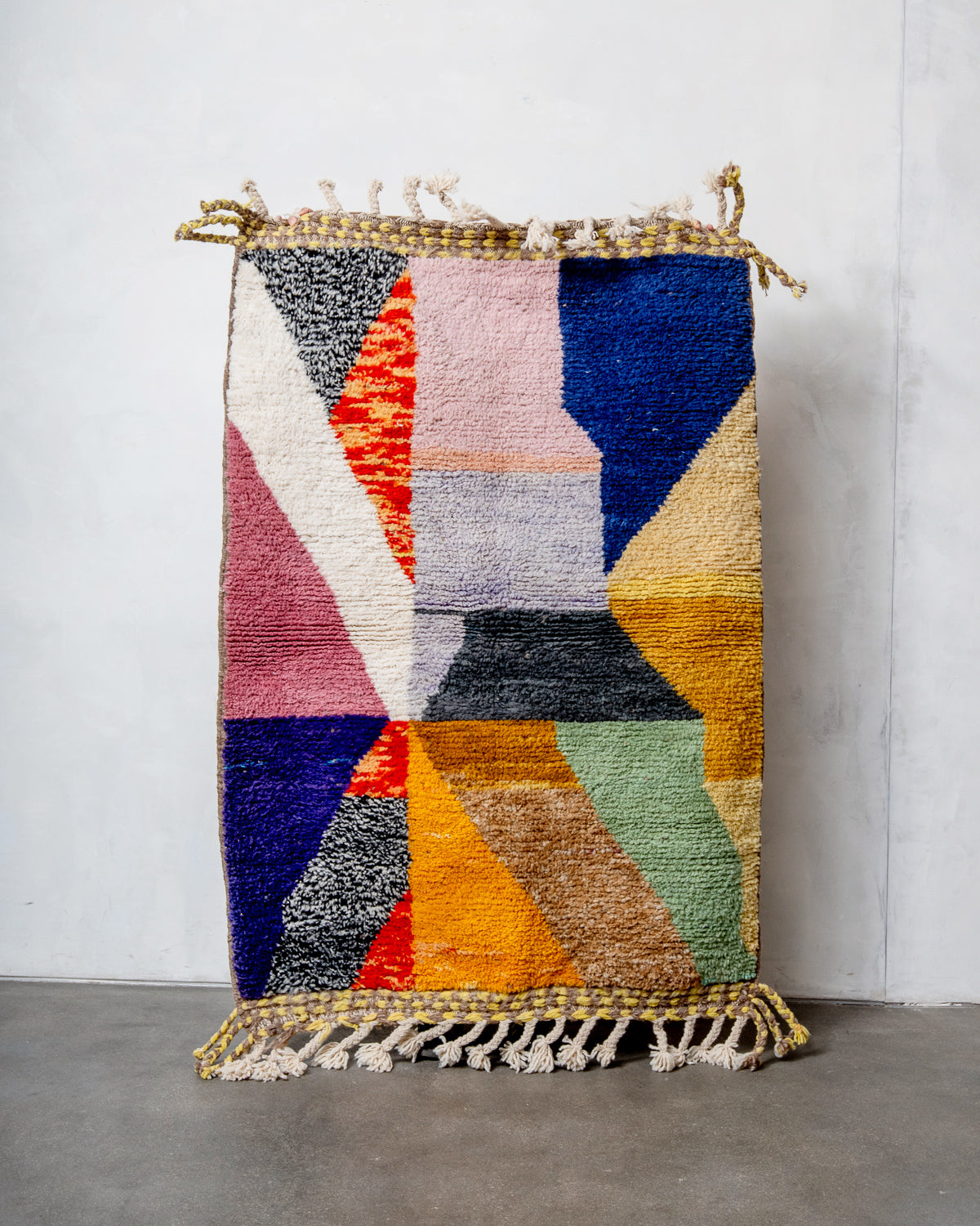 Modern, designer, handcrafted Berber rug from Morocco. Beniourain carpet with beautiful colours and patterns and fluffy wool texture.